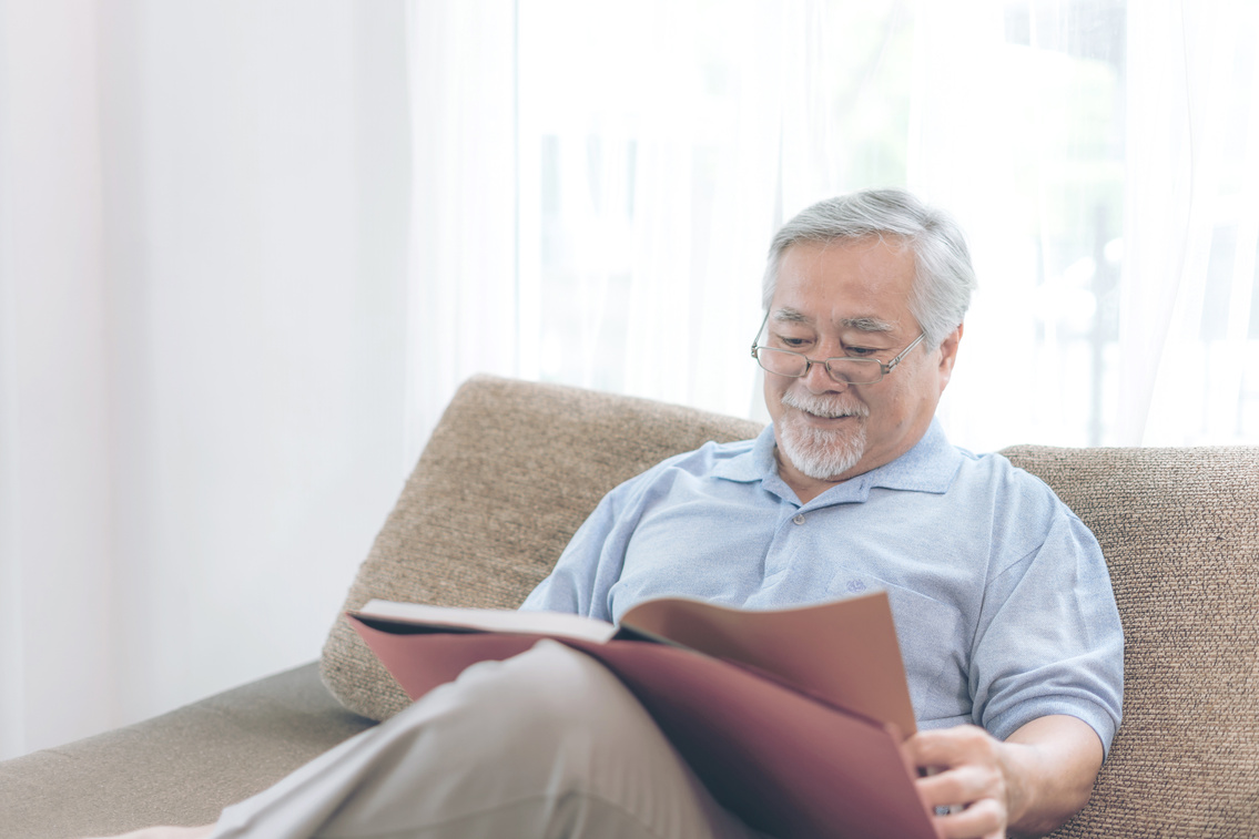 Mature Man Reading at Home